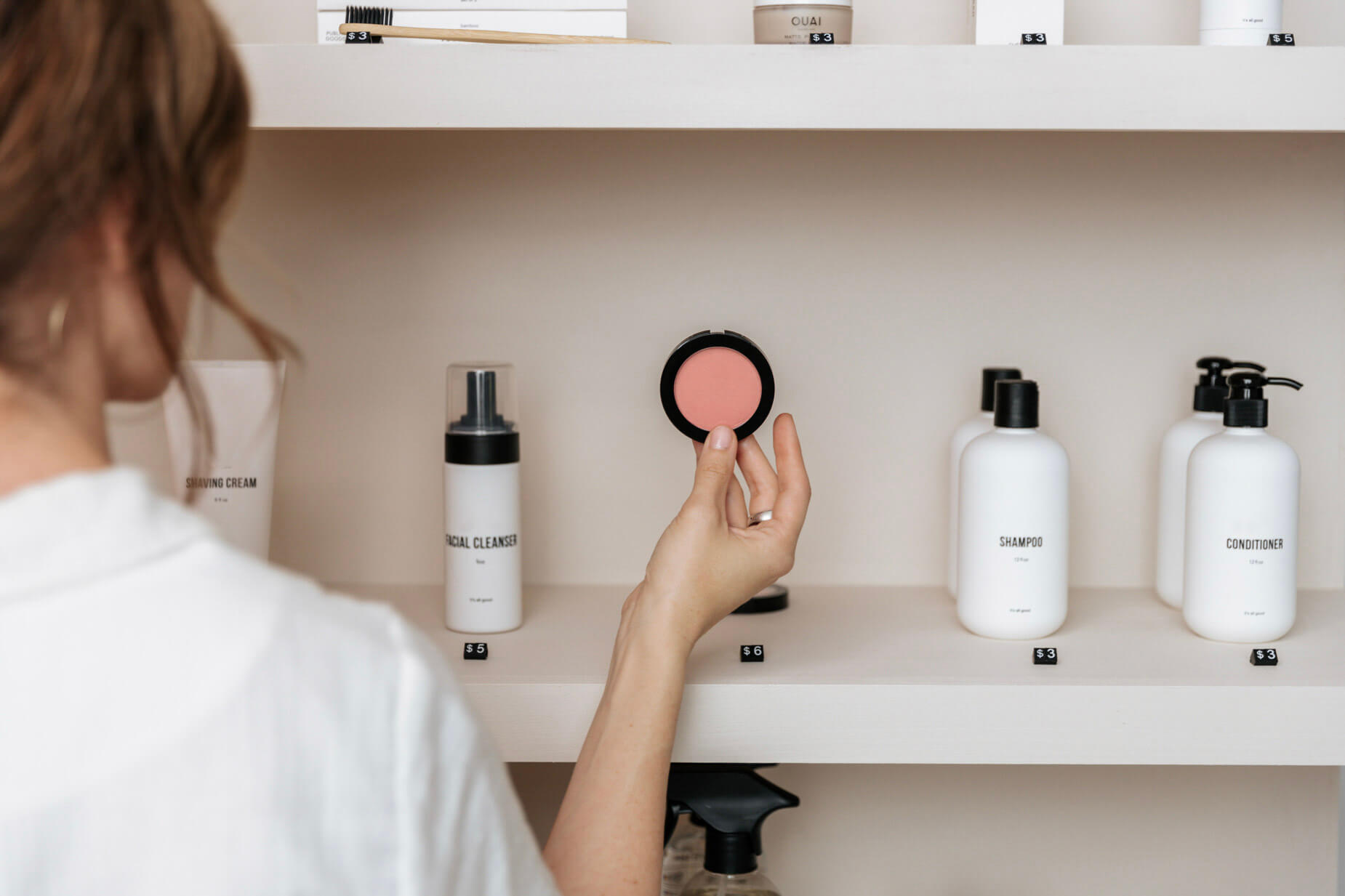 Shopper looking at cosmetics